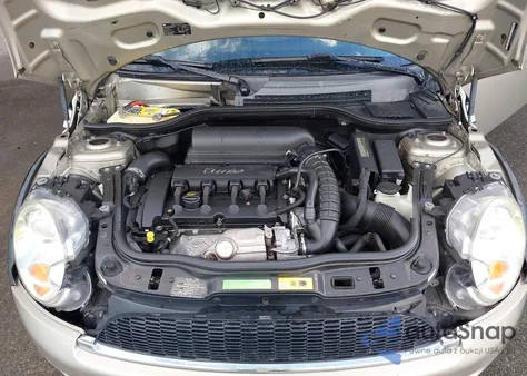 2010 Mini Cooper S z USA, uszkodzony, nr VIN WMWMF7C54ATZ72150